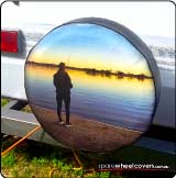Caravan spare tyre cover with a sunset fishing photo